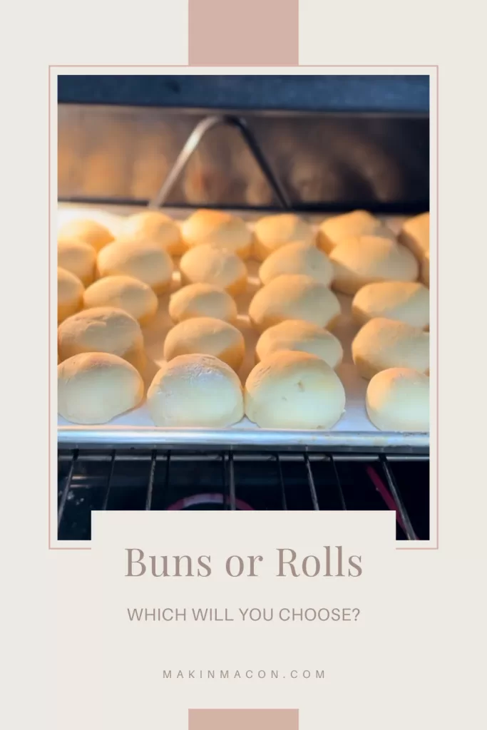 Homemade buns or rolls baking on a sheet pan in the oven, soft and golden with no long rise time