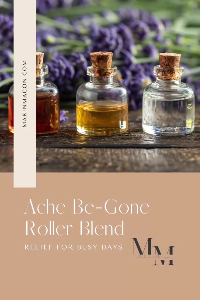 Pinterest pin for Ache Be-Gone Roller Blend featuring glass bottles of essential oils with cork stoppers in front of fresh lavender.