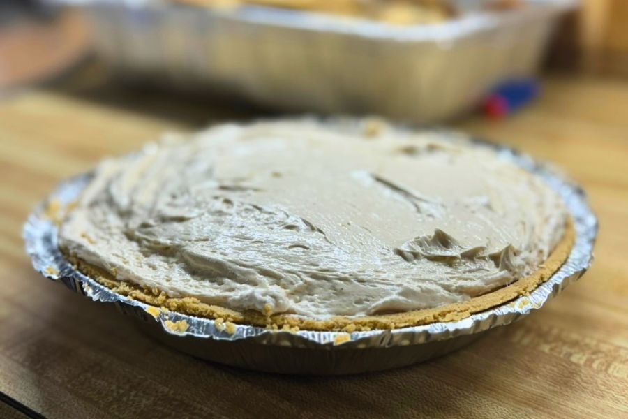 Creamy peanut butter pie in a graham cracker crust ready to chill, no bake dessert
