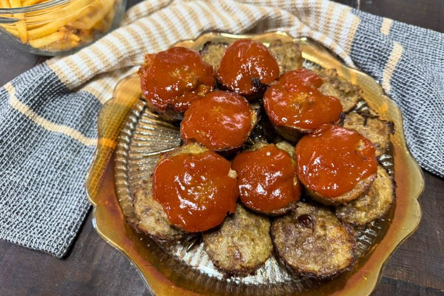 Meatloaf muffins with sauce served on a plate for an easy family dinner