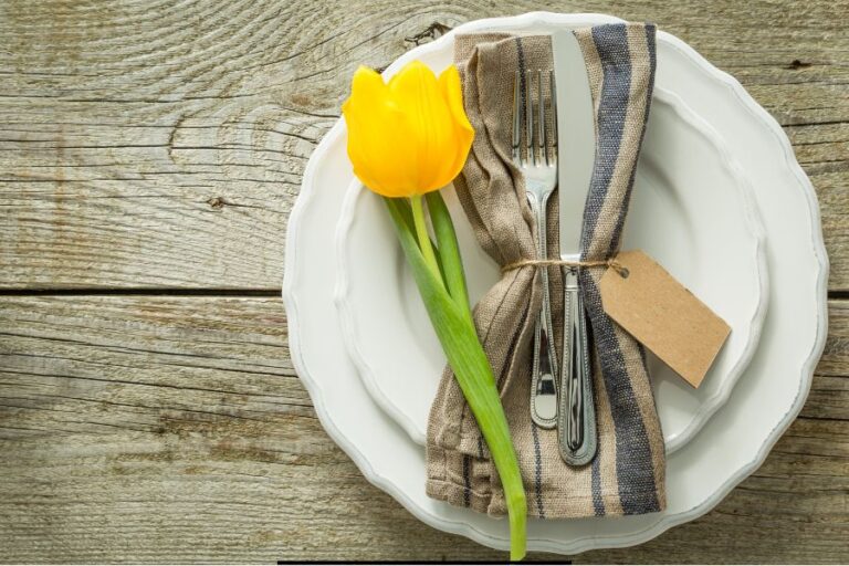 Easy family meals for spring with comforting, frugal recipes perfect for busy homemakers and Sunday dinners. Blog banner featuring a spring table setting with yellow tulip.