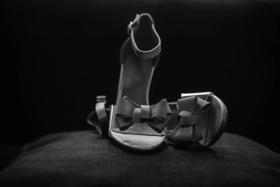 Black and white image of elegant women’s shoes symbolizing spiritual readiness, standing firm in faith, and preparation for where God is leading
