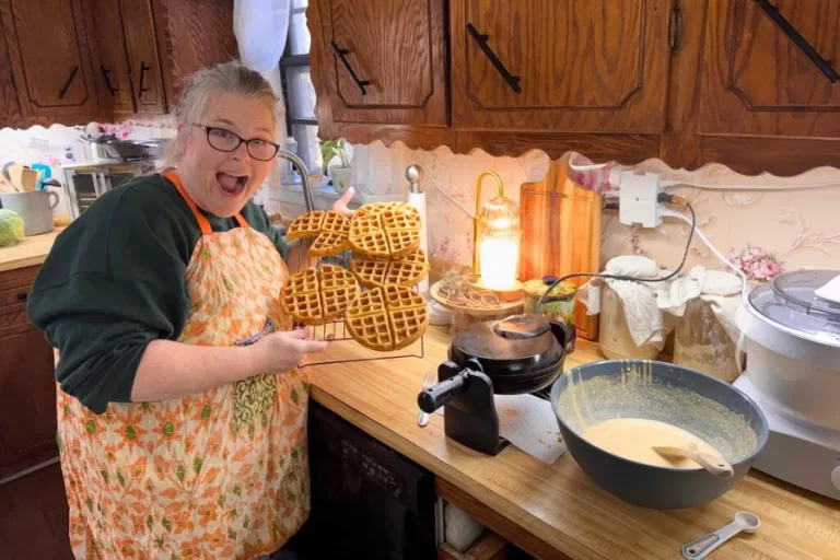Fresh milled flour waffles made with soft white wheat cooling in a home kitchen.