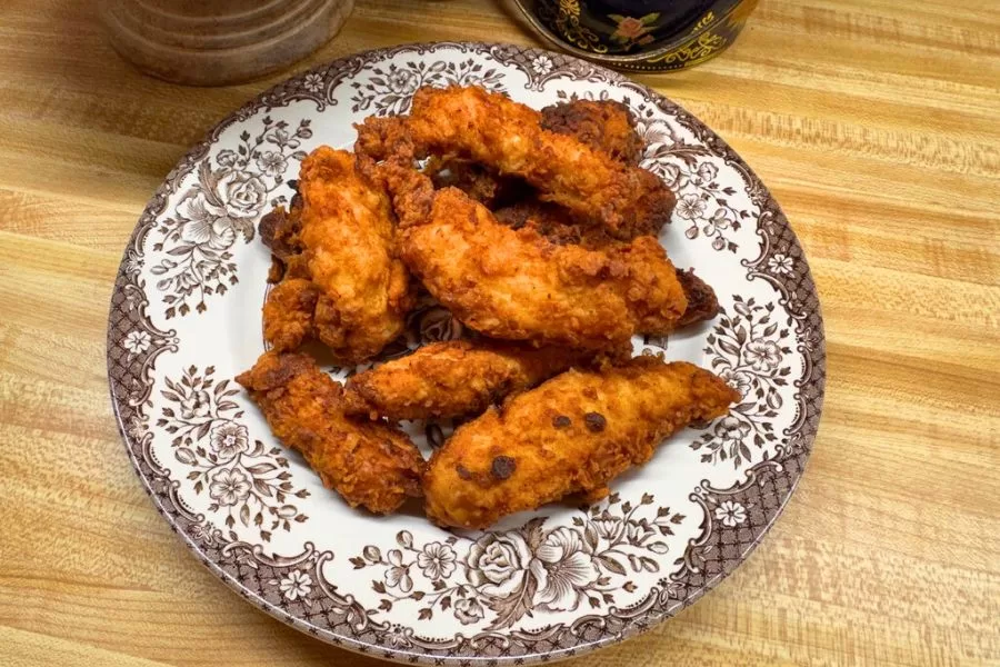 • These homemade chicken strips have a light, golden coating that is crisp on the outside and tender inside. • The marinade is generous and can coat up to 5 chicken breasts, but if cooking more than 3 breasts, you may need to increase the flour coating mixture. • Oil temperature can vary depending on your stove and thermometer. If the coating browns too quickly, reduce heat slightly before continuing. • Chicken can be cut into traditional strips or nugget-size pieces.