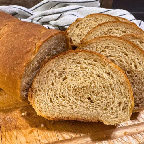 fresh milled flour french bread sliced showing soft crumb texture and golden crust